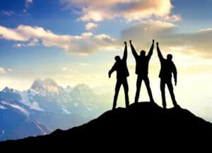 Picture of people standing on top of a mountain