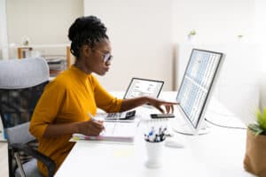 Black Female Accountant Woman Doing Accounting Equation