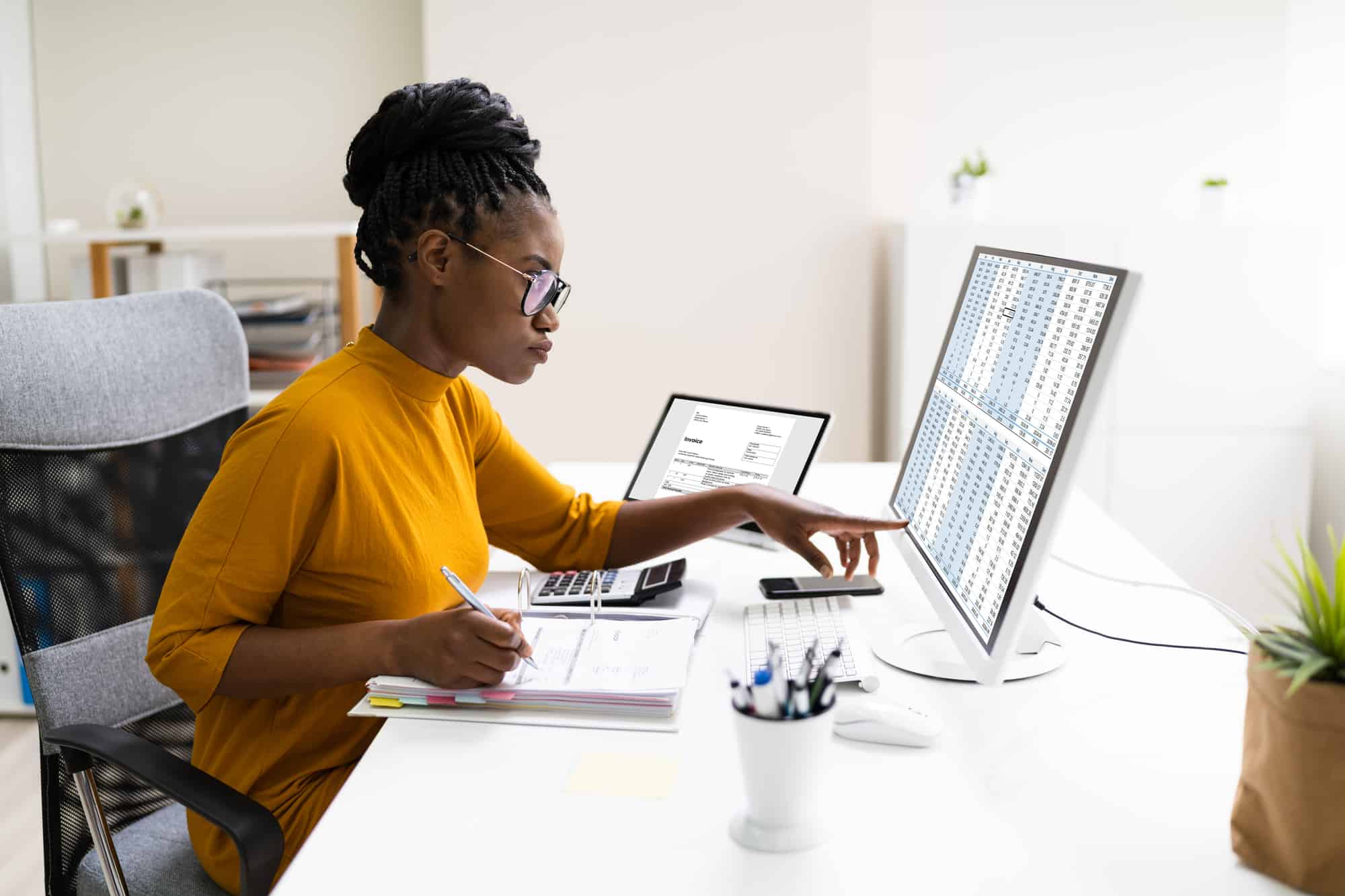 Black Female Chartered Accountant Woman Doing Taxes