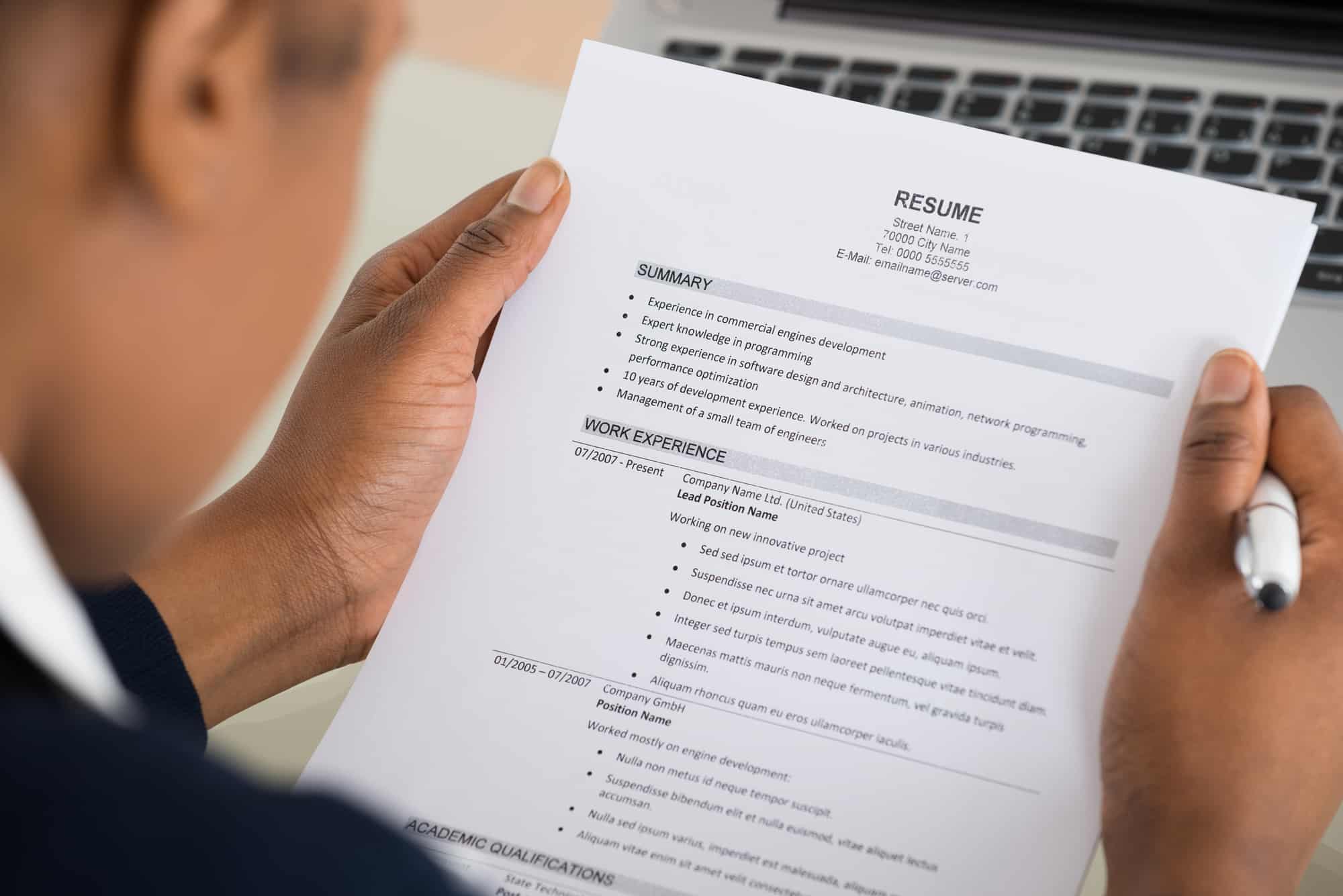 Picture of person holding a resume
