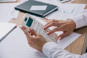 Woman making accounting calculations