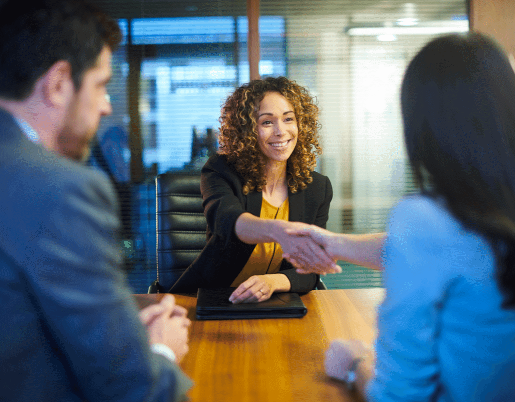 Woman answering interview question about reasons for leaving a job