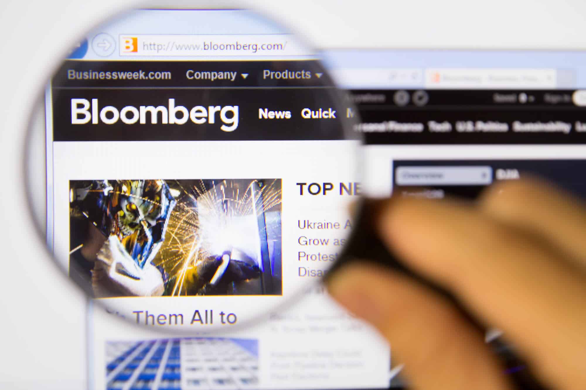 Bloomberg logo through magnifying glass