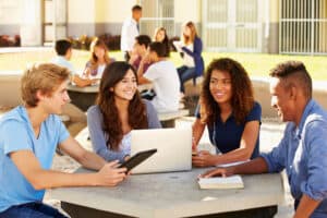 Students studying together at a table.