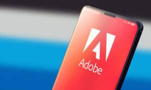A picture of the Adobe logo on a phone
