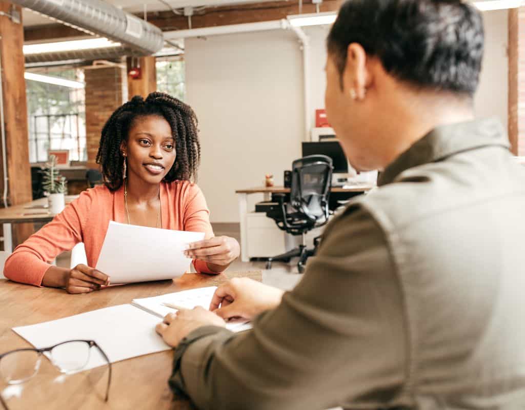 A man wondering how to ask about salary in a job interview