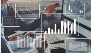 graphs overlayed on image of someone at a laptop